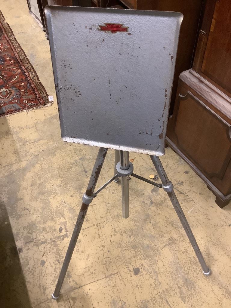 A cast metal music stand and a projector stand (2)